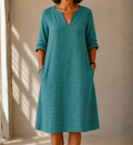 CANDELA™ | VESTIDO MIDI DE LINO CON ESCOTE EN V Y BOLSILLOS