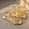 SANDALIAS PLANAS TRENZADAS DORADAS "GIORGIA"